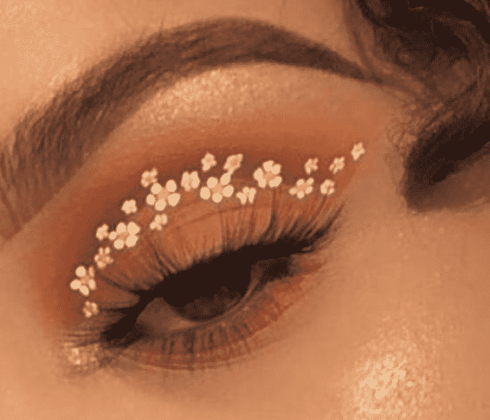 maquiagens coloridas com flores