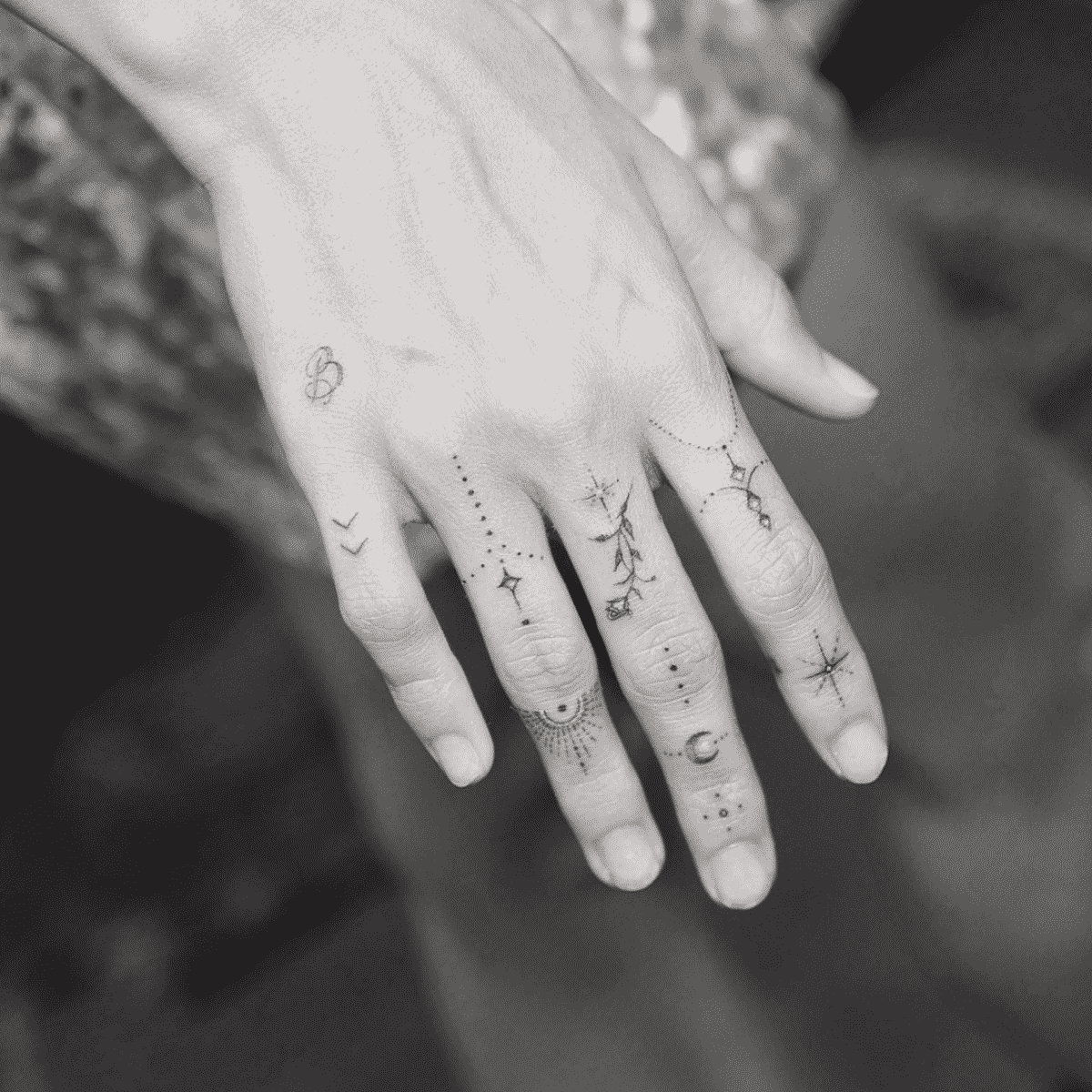 tatuagem na mão